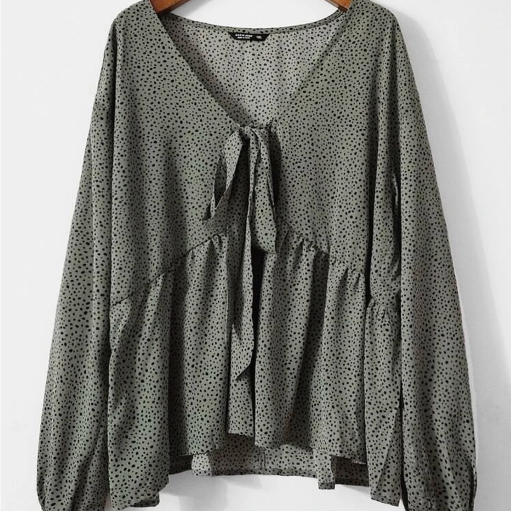 Green ruffle blouse